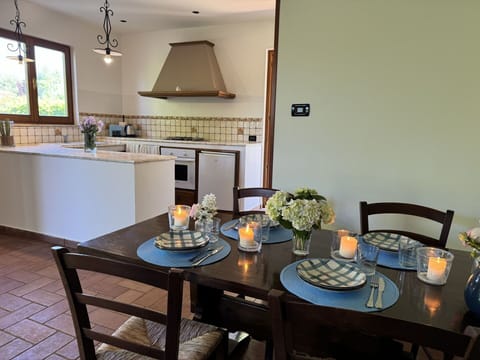 Furniture, Interior Design, Flooring, Wood, Kitchen & Dining Room Table, Light Fixture, Ceiling, Table, Chair, Dining Room