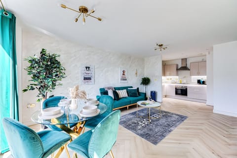 A spacious open-plan living and dining area, complete with a 55” Smart TV for your entertainment and relaxation