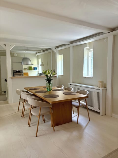 Spacious dining area with original 1880 exposed beams
