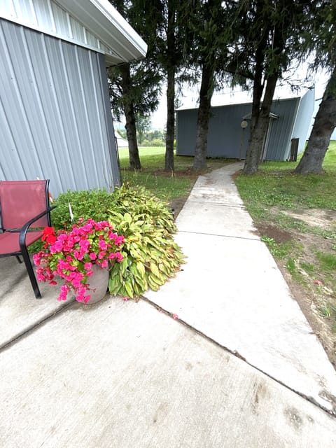 park in front of pictured garage, use sidewalk to back of house to enter. 