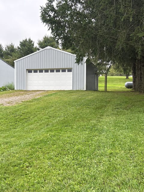 park in front of this garage.  DO NOT park on other side of home. 