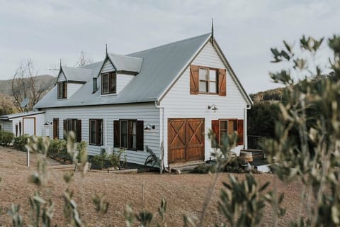 This is River Ranch house. A big old barn style home, with luxury finishes, surrounded by rolling hills, a running river and endless wildlife.