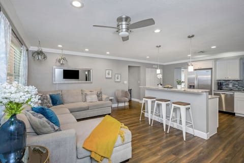 Gather with loved ones in the open living space, perfect for movie nights and shared meals.