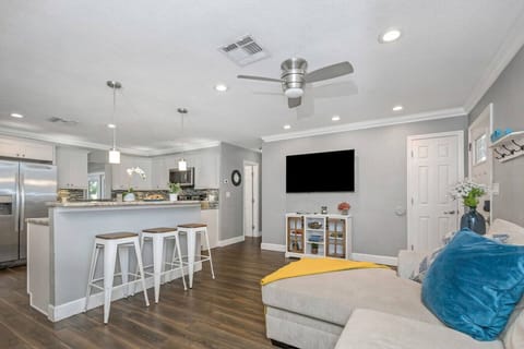 Cook, dine, and unwind together in this open-concept space.