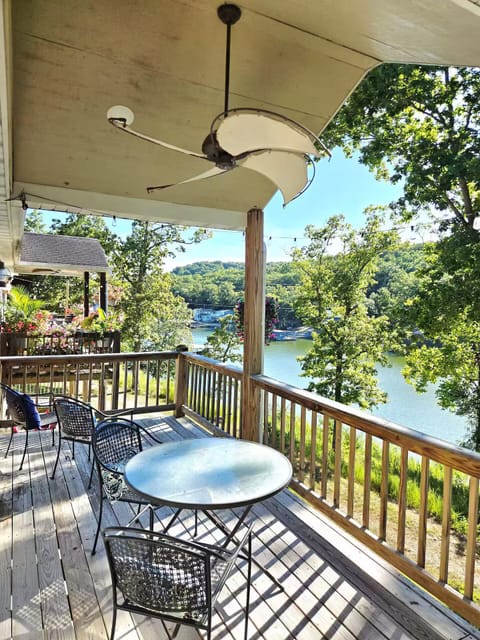View of the lake from the main floor deck.  Enjoy morning coffee or a meal here!