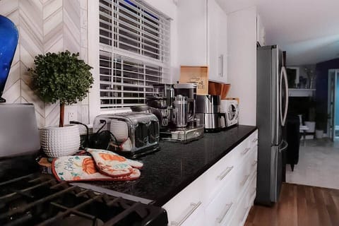 The kitchen comes loaded with quality small and large appliances