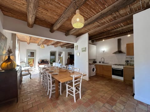 living room, dining room, dining area, kitchen, oven, dishwasher, washing machine, fridge