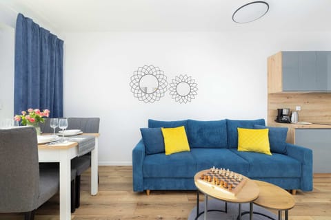 Large table with chairs for eating communal meals. 