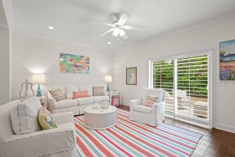 Your comfortable and colorful living room can't help but put you in a good mood.