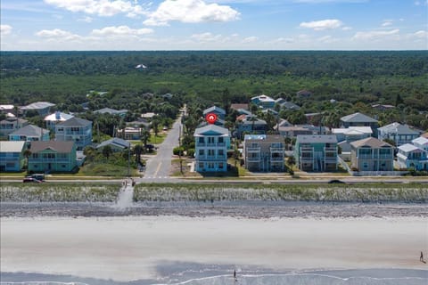Aerial view of houses in a coastal community.