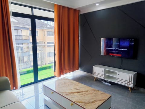 Large Living Room With Extra Large 3 seater Couch, Fast WiFi , Smart TV Netflix