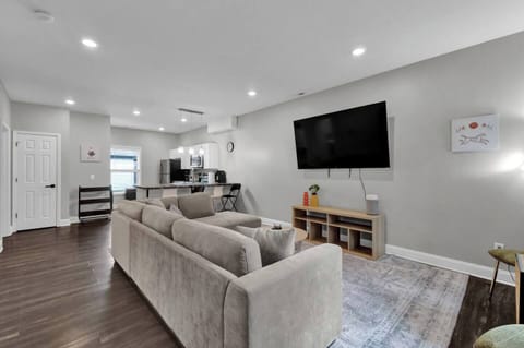 Comfortable living room with seating and large TV