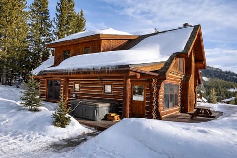 Charming cabin exterior surrounded by nature.