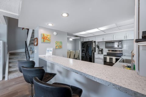 Breakfast bar with barstools