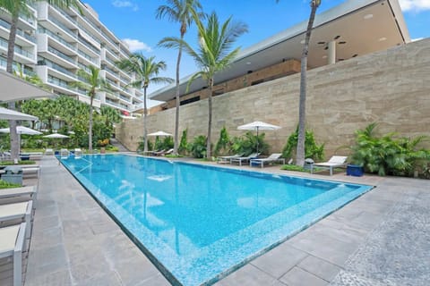 Shared pool area with umbrella areas 