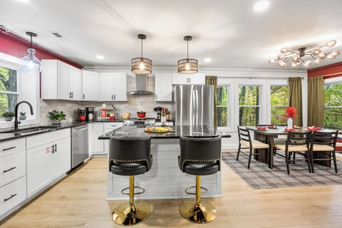 Sleek, modern kitchen with barstool seating.