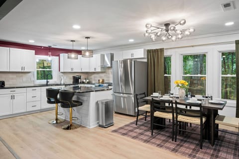 Enjoy the perfect blend of style and functionality with our large island featuring high seating for relaxed dining.