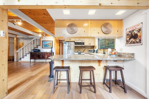 Fully equipped kitchen with modern appliances for your culinary creations.