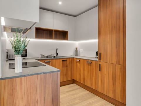 Wood, Flooring, Interior Design, Kitchen, Cabinetry, Floor, Countertop, Kitchen Appliance, Wood Stain, Hardwood