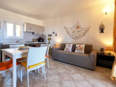 Furniture, Interior Design, Wood, Flooring, Table, Floor, Chair, Couch, Lighting, Apartment