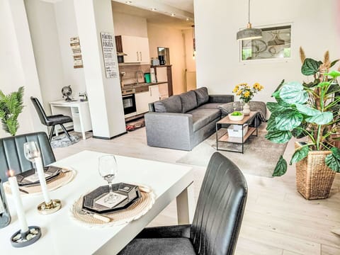 Furniture, Interior Design, Couch, Flooring, Floor, Wall, Room, Living Room, Wood, Ceiling