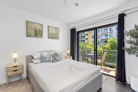 Wake up to lush greenery and natural light from your private balcony access.