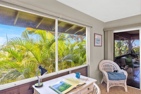 A charming corner with garden views, ideal for enjoying a cup of coffee or quiet time