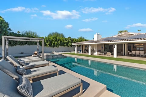 20'x60' heated, saltwater pool with baja shelf, deep end, spa