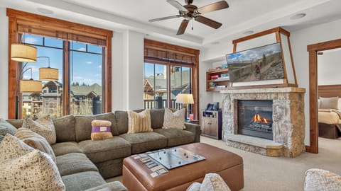Great Room, Main Level - Fireplace with TV and seating area