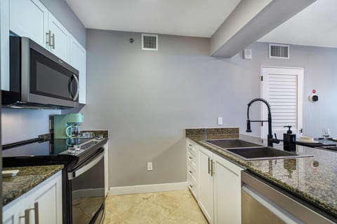 Fully equipped kitchen with stainless steel appliances
