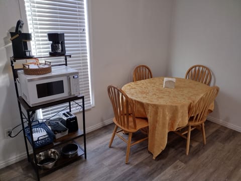 Dining area with seating for 4. Can use outdoor chairs for additional seating.