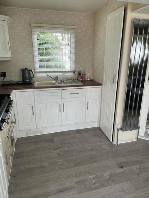 Bright kitchen with modern cabinetry and natural light