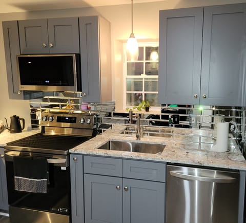 Fully-equipped, high-efficiency, brand new appliances, motion-sensor faucet