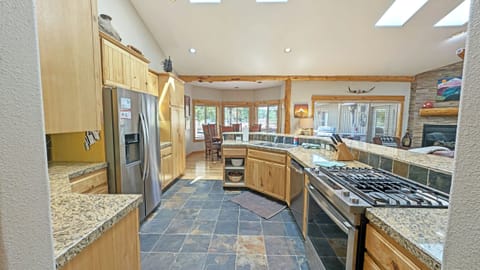 The kitchen is full of beautiful stainless steel appliances