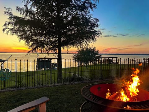 Enjoy beautiful sunsets by the fire.