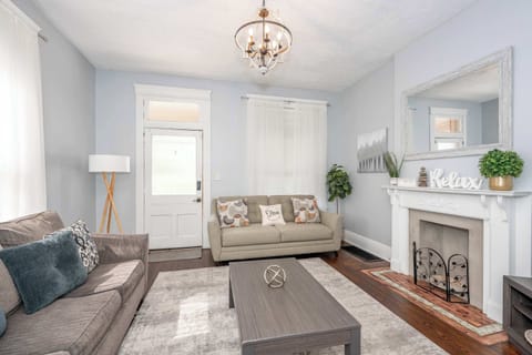 Curl up in the airy living room & stream your favorites on the smart TV​