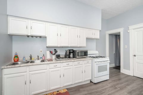 Suite 1’s inviting eat-in kitchen offers ample space & all the comforts of home​