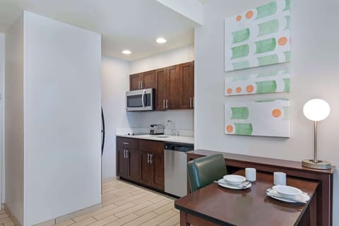 Prep snacks comfortably with generous counters and modern appliances.