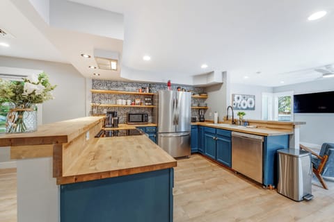 These fun blue cabinets add unique pops of color to the home | Interior