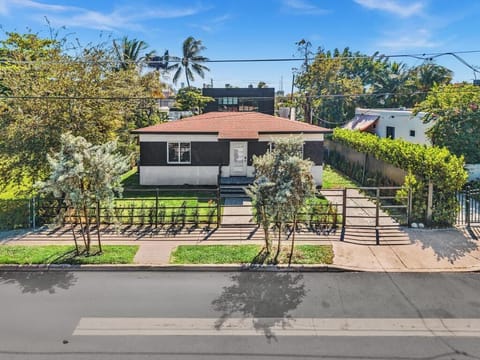 This gated home features 4 bedrooms and 2-in-a-half baths.