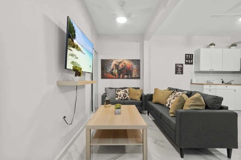 Cozy living room with large TV for movie nights!