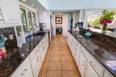 A spacious fully equipped  kitchen is essential for hosting successful large family gatherings.