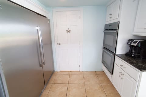 Our concierge service includes grocery delivery, with items conveniently stored in the spacious double-door refrigerator upon arrival.