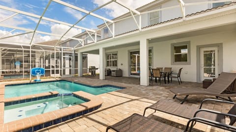 Pool Area: Dive into relaxation with a sparkling outdoor pool, surrounded by loungers and seating for sun-soaked afternoons.
