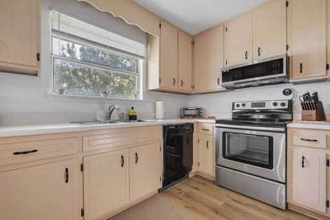 The kitchen has all new appliances, all new dishes, glasses, utensils and serving ware.  A toaster oven and blender also available for guests use.