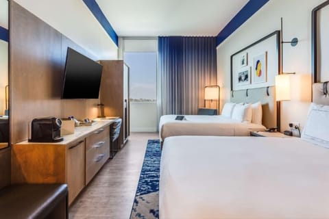 Wake up to daylight views in a spacious, calming room.