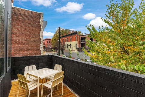 Private deck with four chairs for enjoying during your stay 
