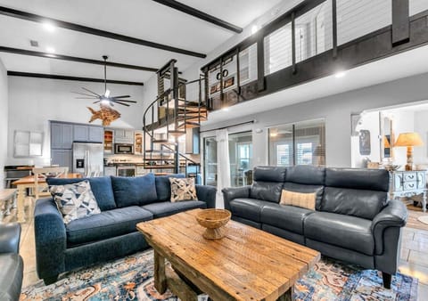 Spacious living room with vaulted ceilings and cozy seating