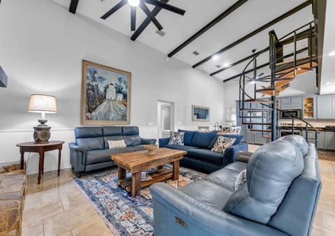 Spacious living room with vaulted ceilings and cozy seating