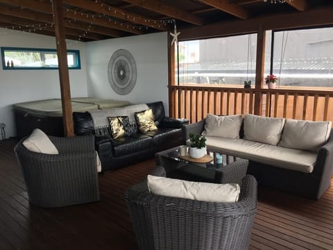 Outdoor deck with spa pool.
